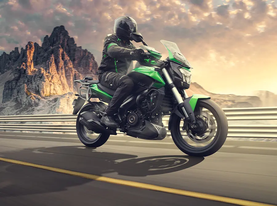 Rider on a Bajaj Dominar on a mountain road